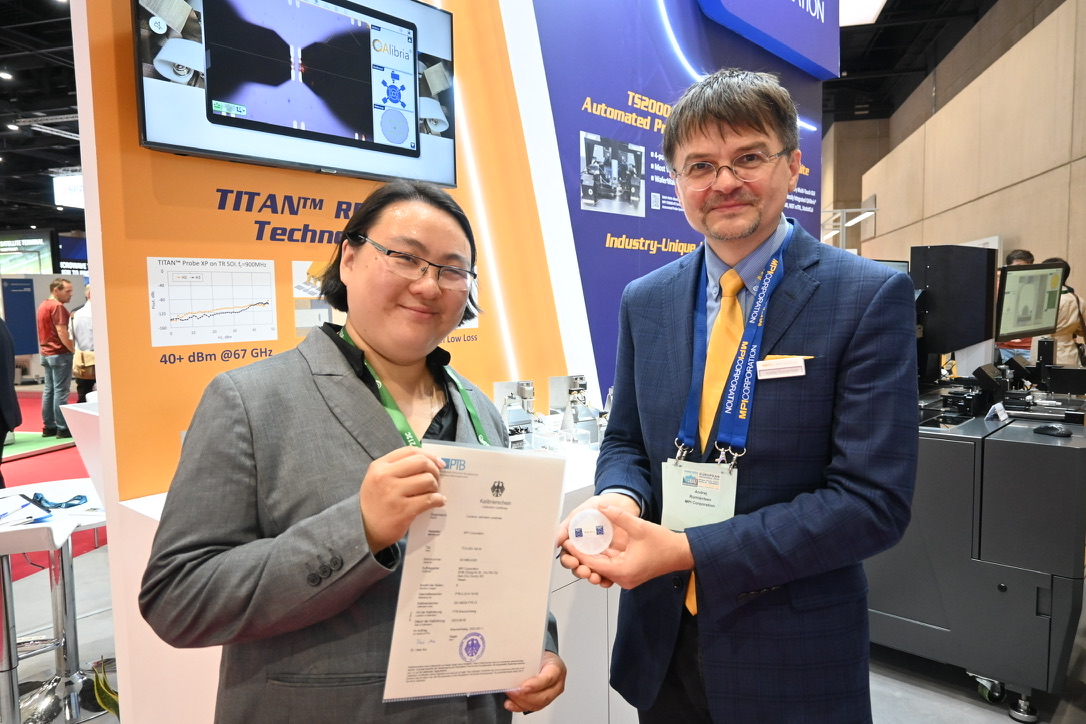 Dr Gia Ngoc Phung PTB Germany passes the TCS 050 100 W Calibration Substrates Certificate to MPI Corporation